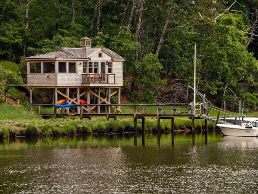 Custom Cape Cod boathouse by McPhee Associates of Cape Cod